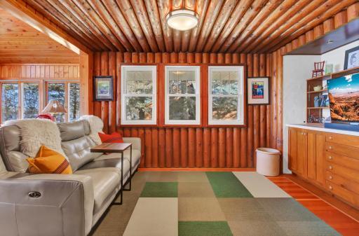 Den off the great room with built-ins