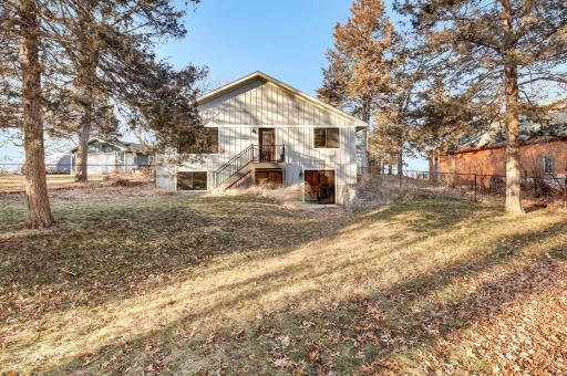 Backyard has walkout & fenced area