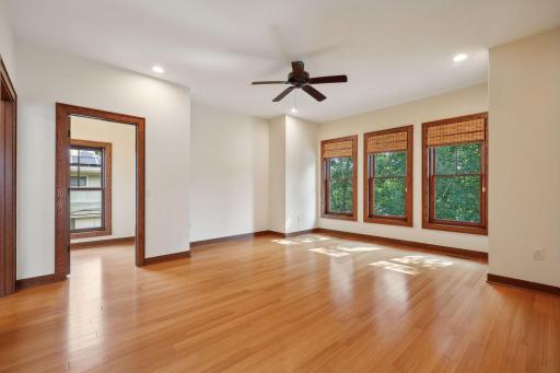Upper level bedroom 2 with walk-in closet.
