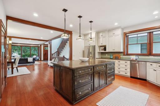 Large center island with granite counters.