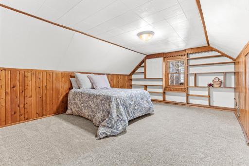 The upper level is quite spacious! This level features 2 closets, newer carpet, and excellent headroom.
