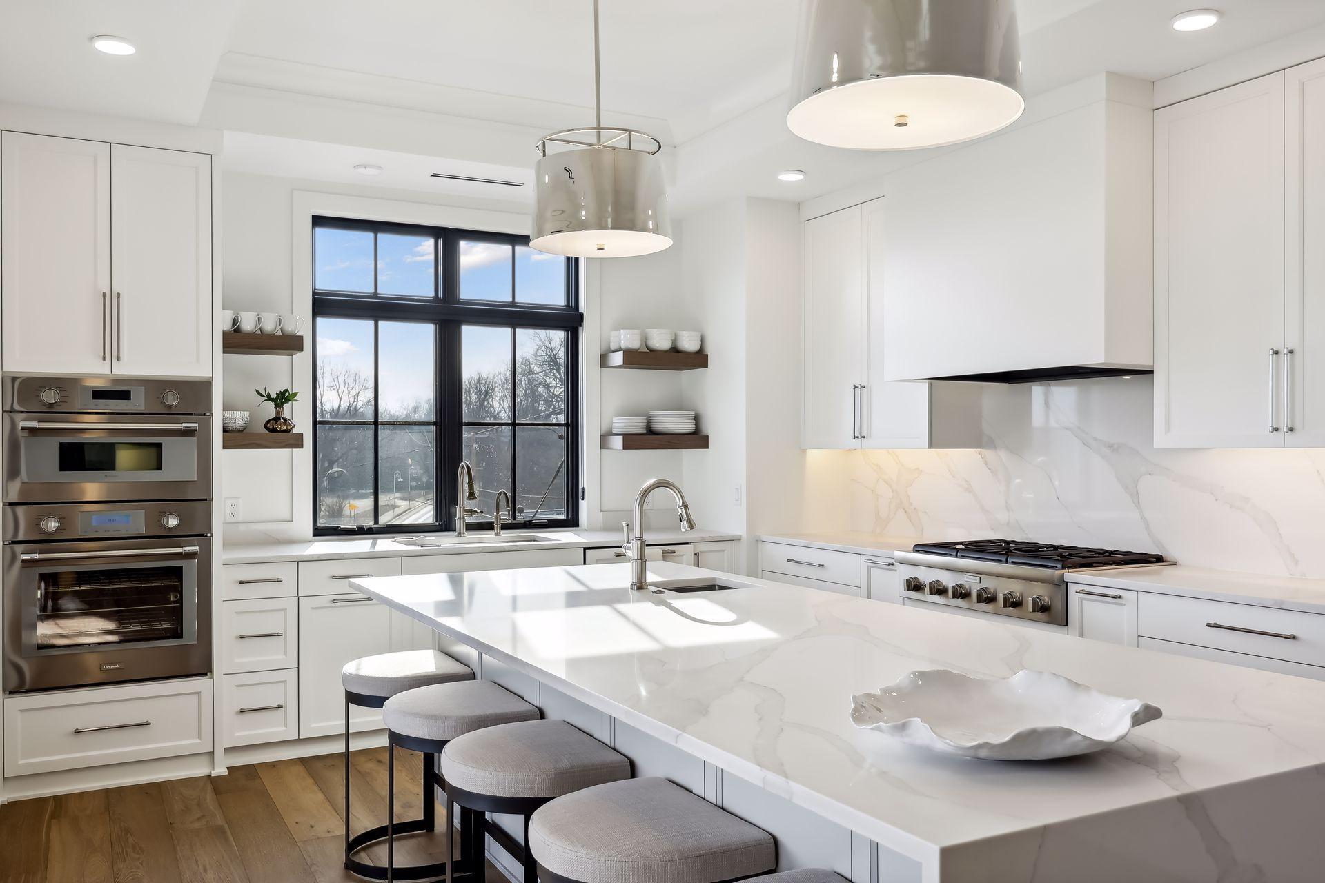 Spacious center island is ideal for meal prep or grabbing a quick bite to eat