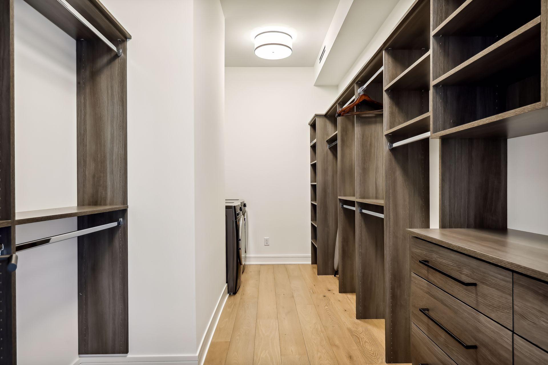 Amazing primary closet space with built-in components