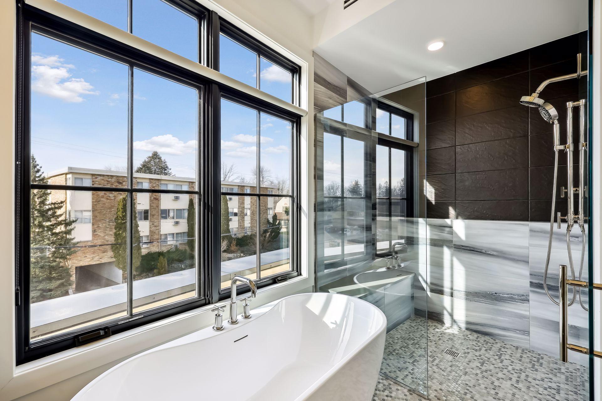 Soak the stress away in the large tubor the spacious shower with dual shower heads