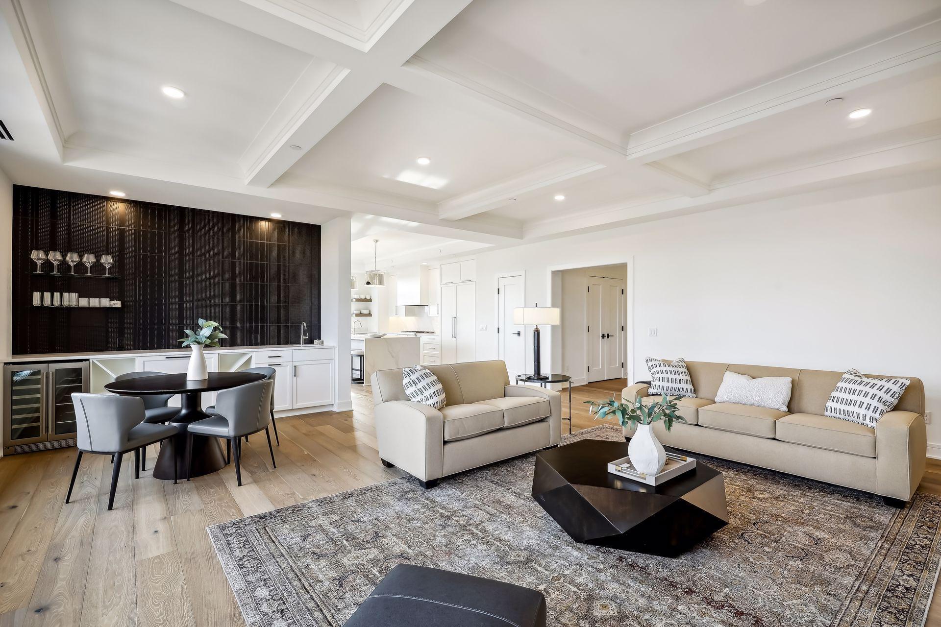 A stunning wet bar anchors the other end of the living room