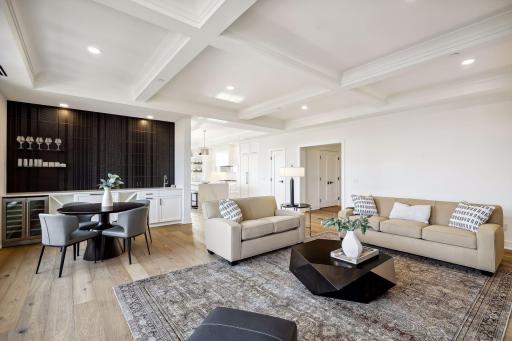 A stunning wet bar anchors the other end of the living room
