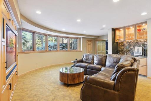 Bright family room with wet bar + Subzero drawers
