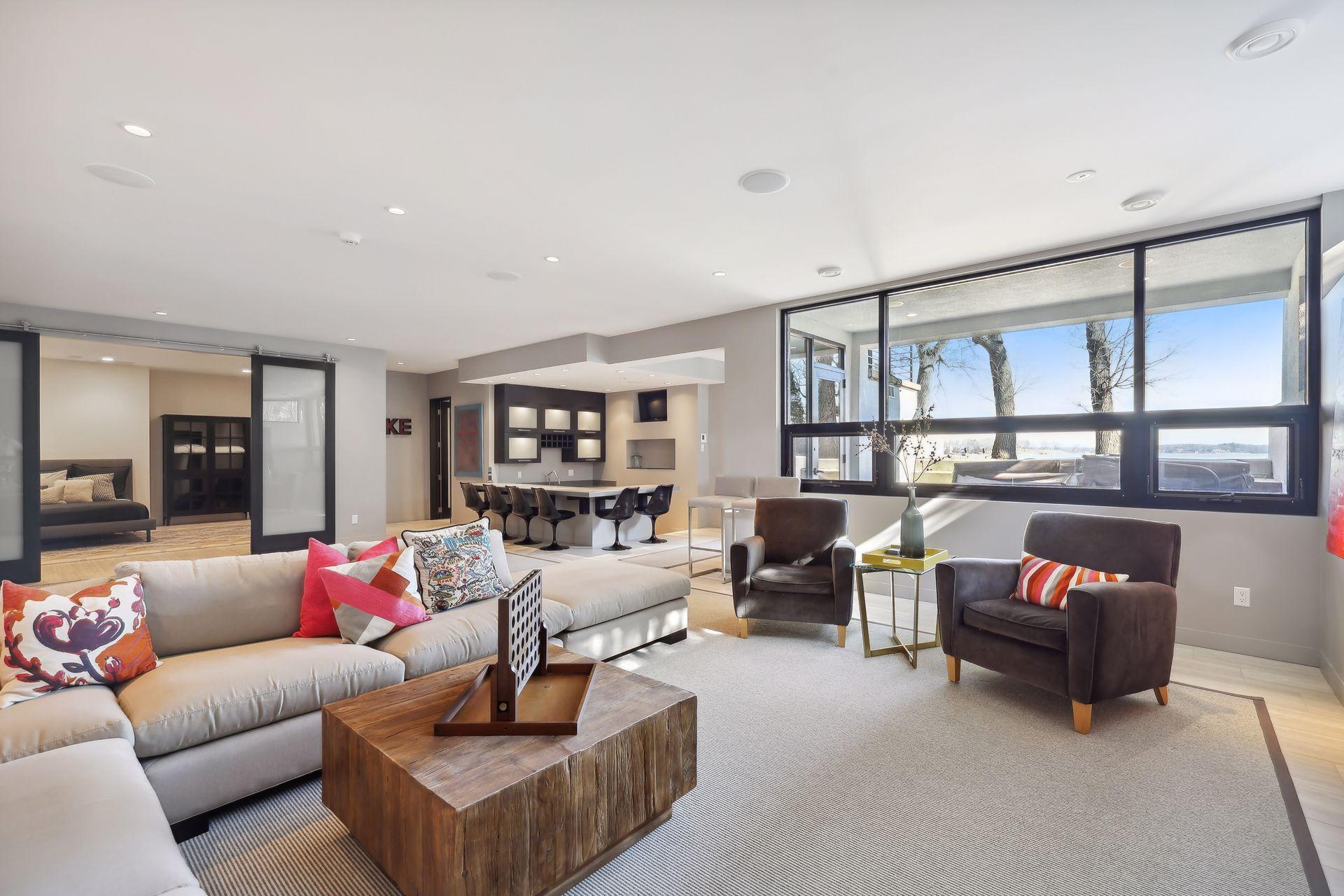 Lower level family room with step down bar and outdoor access