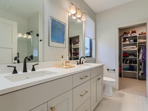 Primary Bath leads to large Walk-in closet