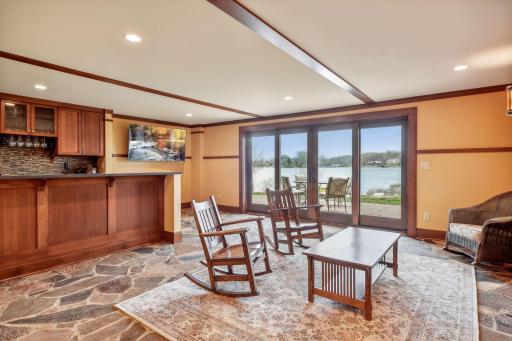 Family room with full bar, which walks out to patio