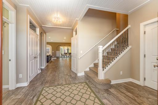 Entry off the front door with an elevator directly to the right as you enter.