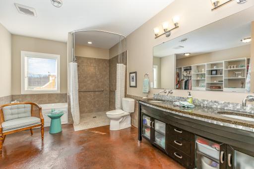 Zero entry shower make this bathroom accessible.