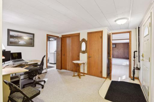 Lower level entry area that has flexible space outside of the separate entrance to apartment