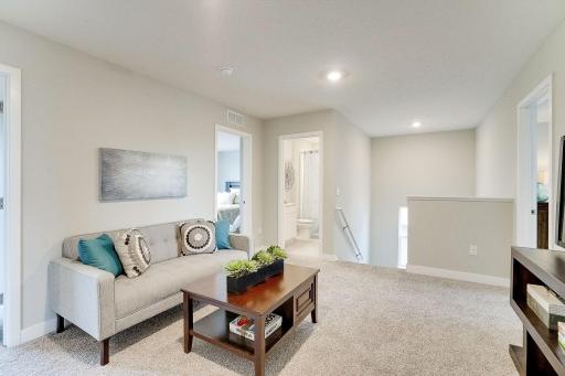 Upper level loft gives you a 3rd family room space.