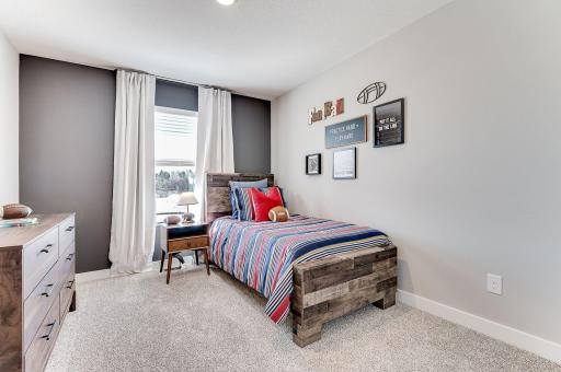 All four bedrooms upstairs are spacious and bright! Photo of model home, color & options will vary.