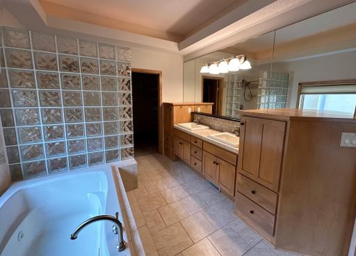 Full bath with jetted tub, separate shower and huge closet