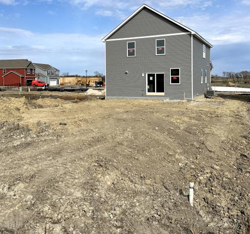 Pardon the mess! Home is under construction. Picture is of actual home. Look at this amazingly spacious backyard on the oversized homesite.