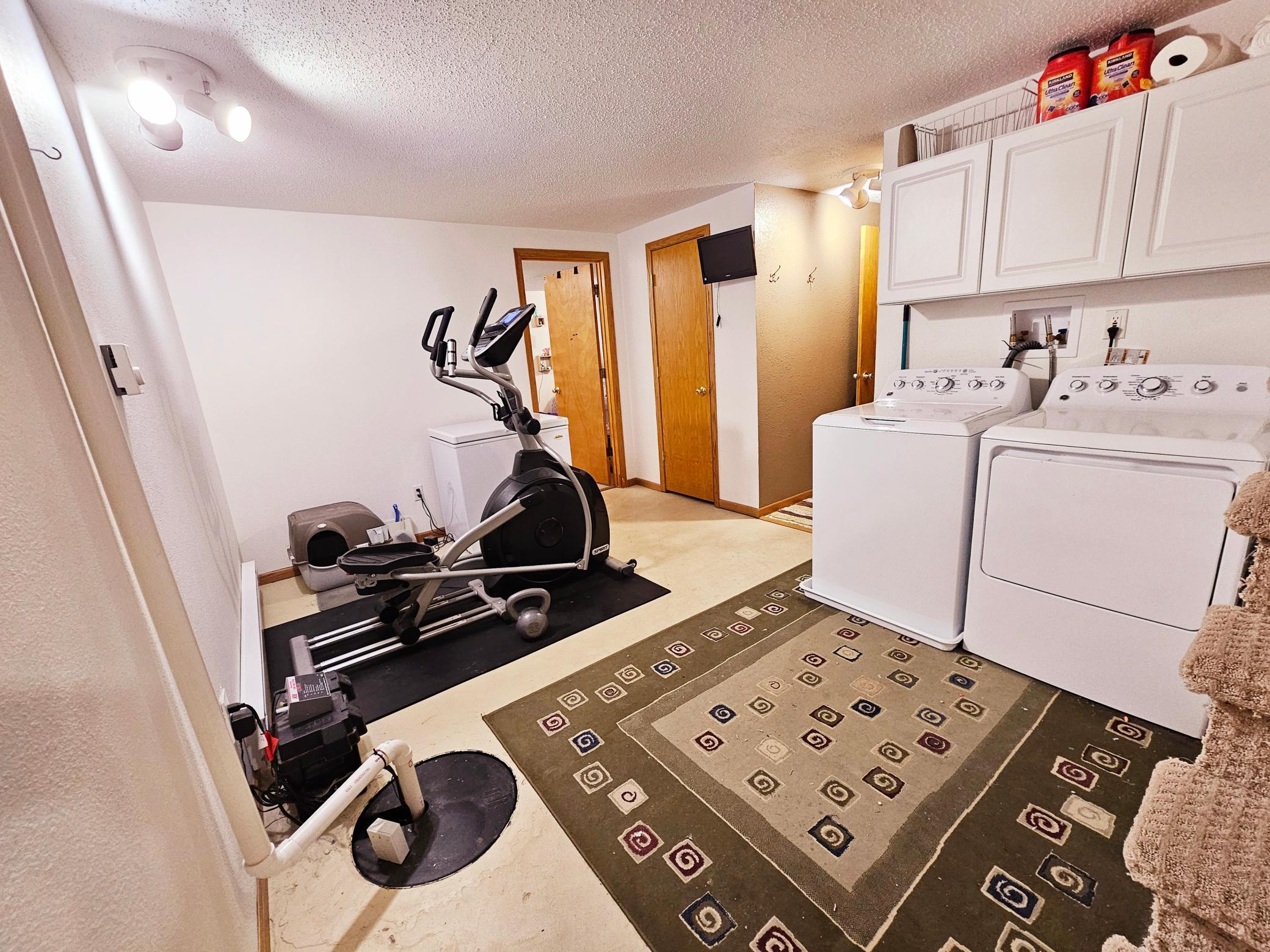 Laundry/exercise area