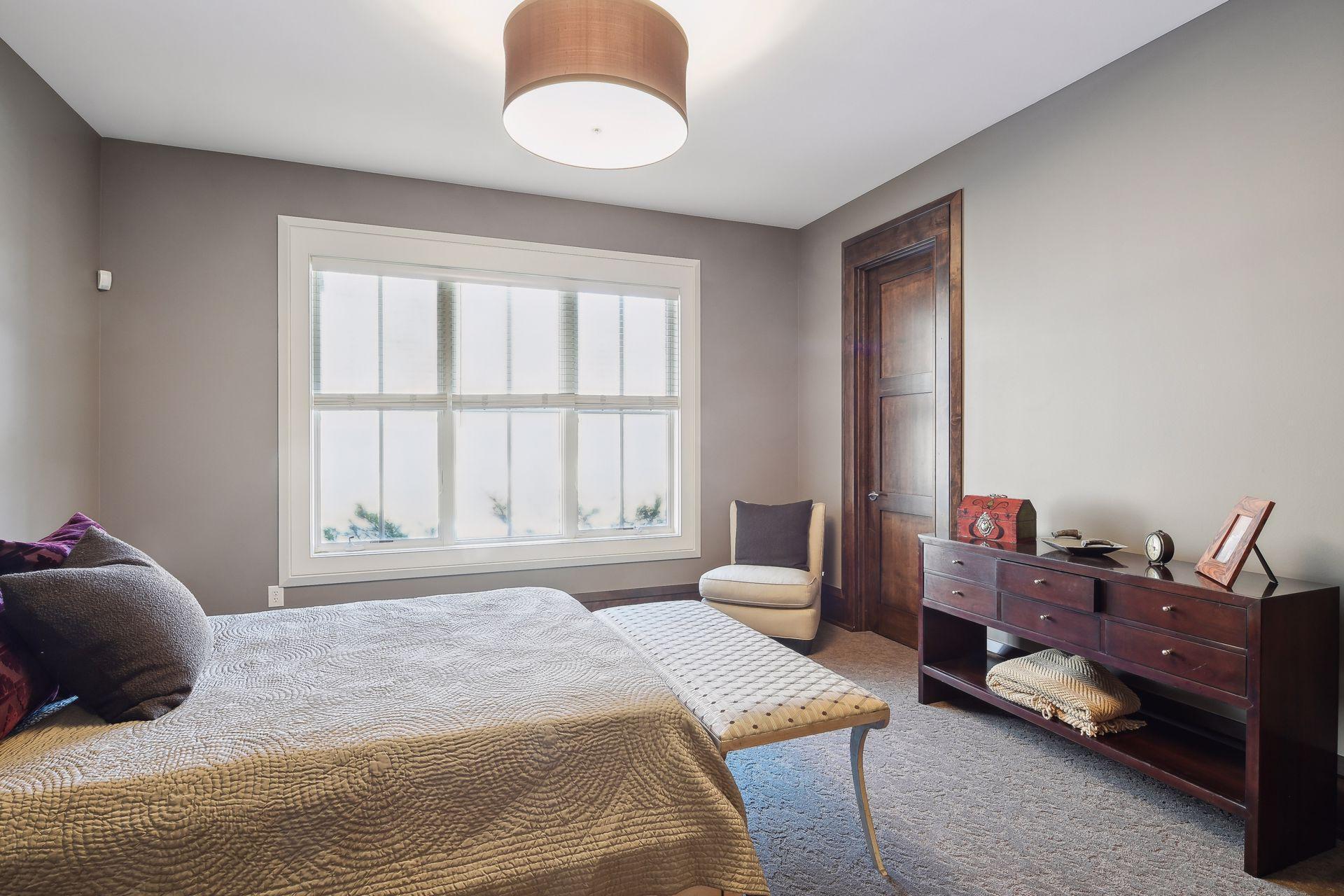 5th bedroom with view to woods with 3/4 bath