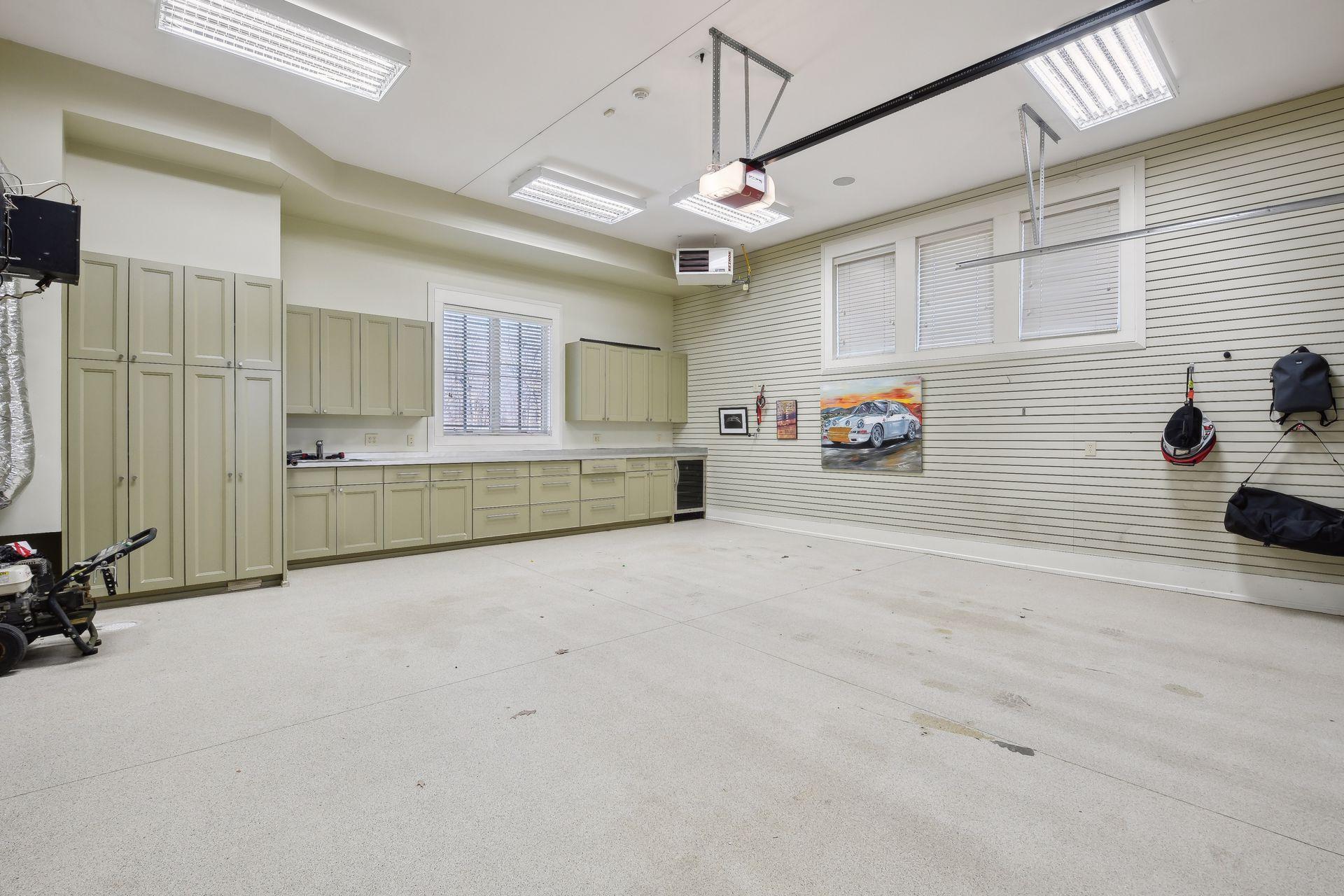 Each garage has storage, heated, 4 car garage