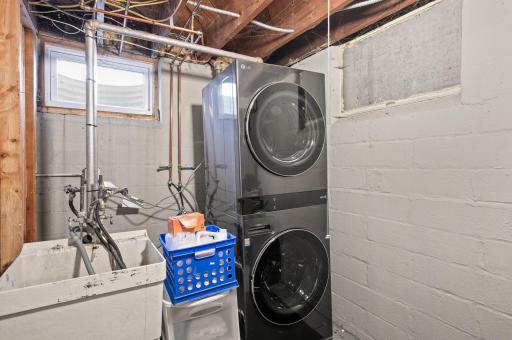 The lower level laundry area also provides additional storage.