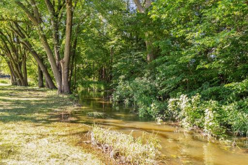Creek runs along the west side of the property
