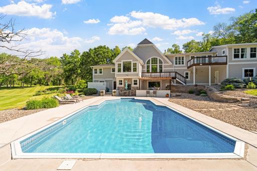 In-ground heated pool is full size! Depth ranging from 3' to 8' & has automatic cover