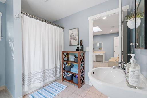 Jack & Jill Bathroom features ceramic tile flooring