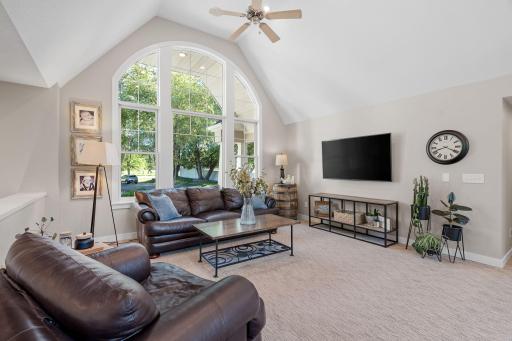 Living Room offers vaulted ceilings w/ recessed lighting