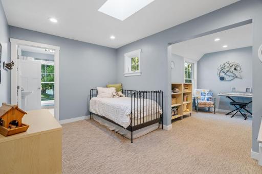 Bedroom 2 has a skylight and charming attic ceilings