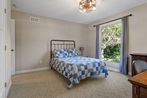 Bedroom 4 is tucked away in a quiet area of the home