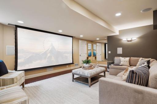 JVC DILA (4k 3D) projector system with electric screen and surround sound.