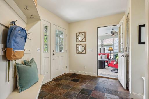 Large mudroom with dual closets and built-ins.