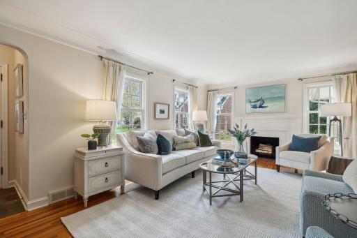 Wonderful original details including coved ceilings, hardwood floors, and expansive windows.