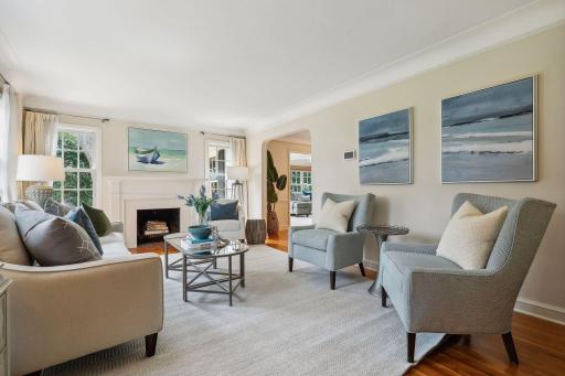 Archway leads you into the formal dining room.