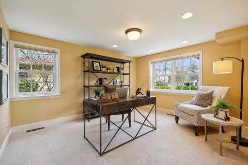 Main level office is also a legal bedroom with private 3/4 bath and laundry hookup, too! Opportunity for all main level living.