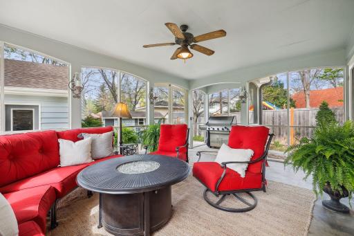 Serene, screened porch with grilling area.