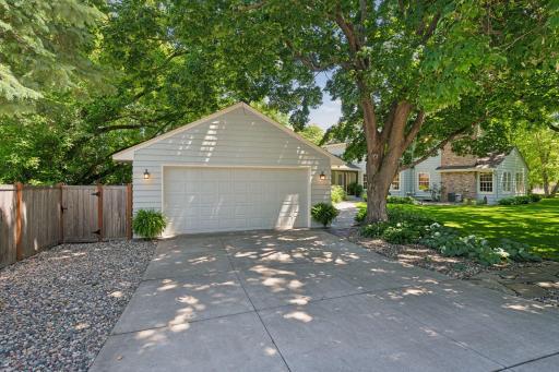 Newer concrete driveway offers plenty of space for guest parking.