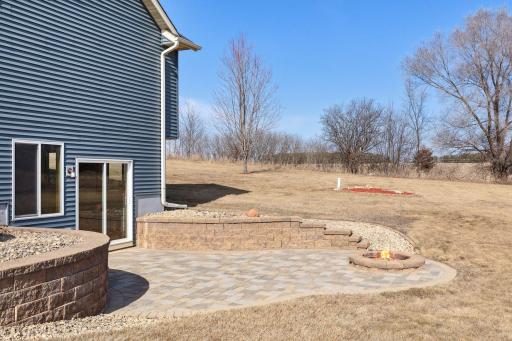 You will enjoy cozy time around your pack brick patio and fire pit