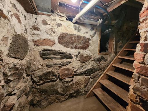 Decent access to basement and access to crawl space below main level bedroom