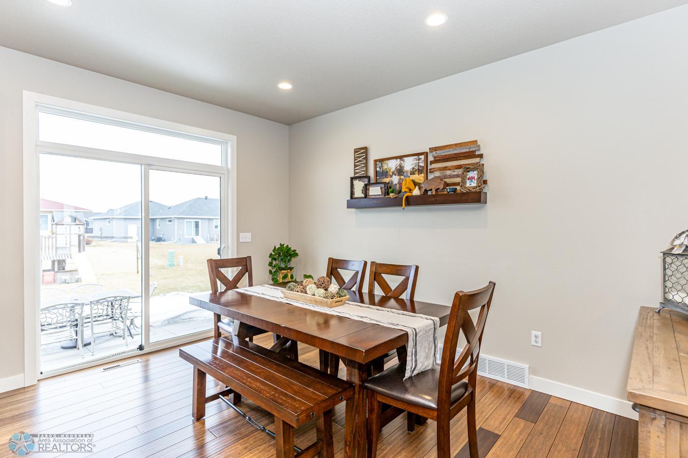 Dining with patio door to back yard & added transom