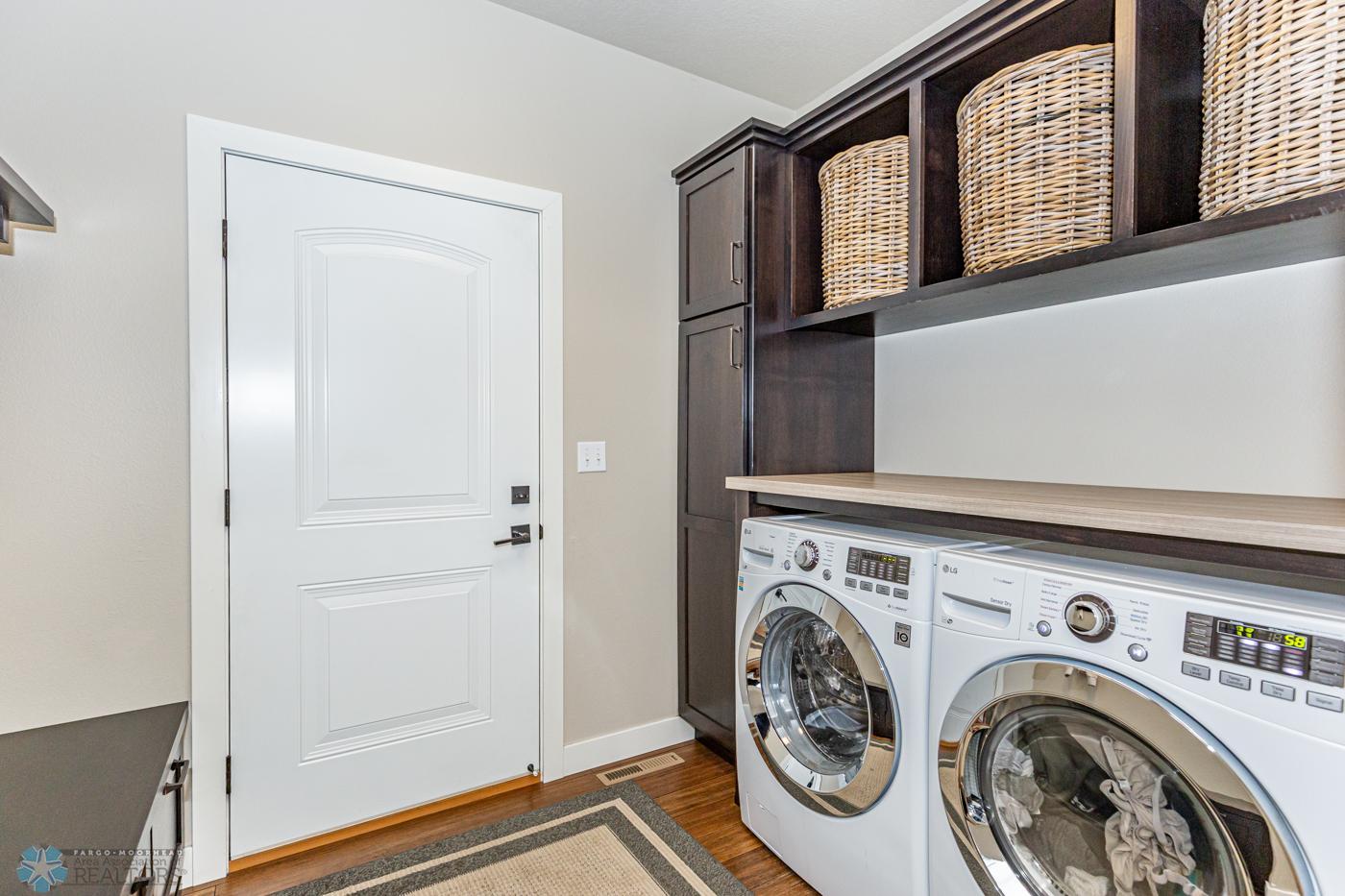 Laundry/Back Entry | Cleaning cabinet & laundry-basket storage! (Baskets included)