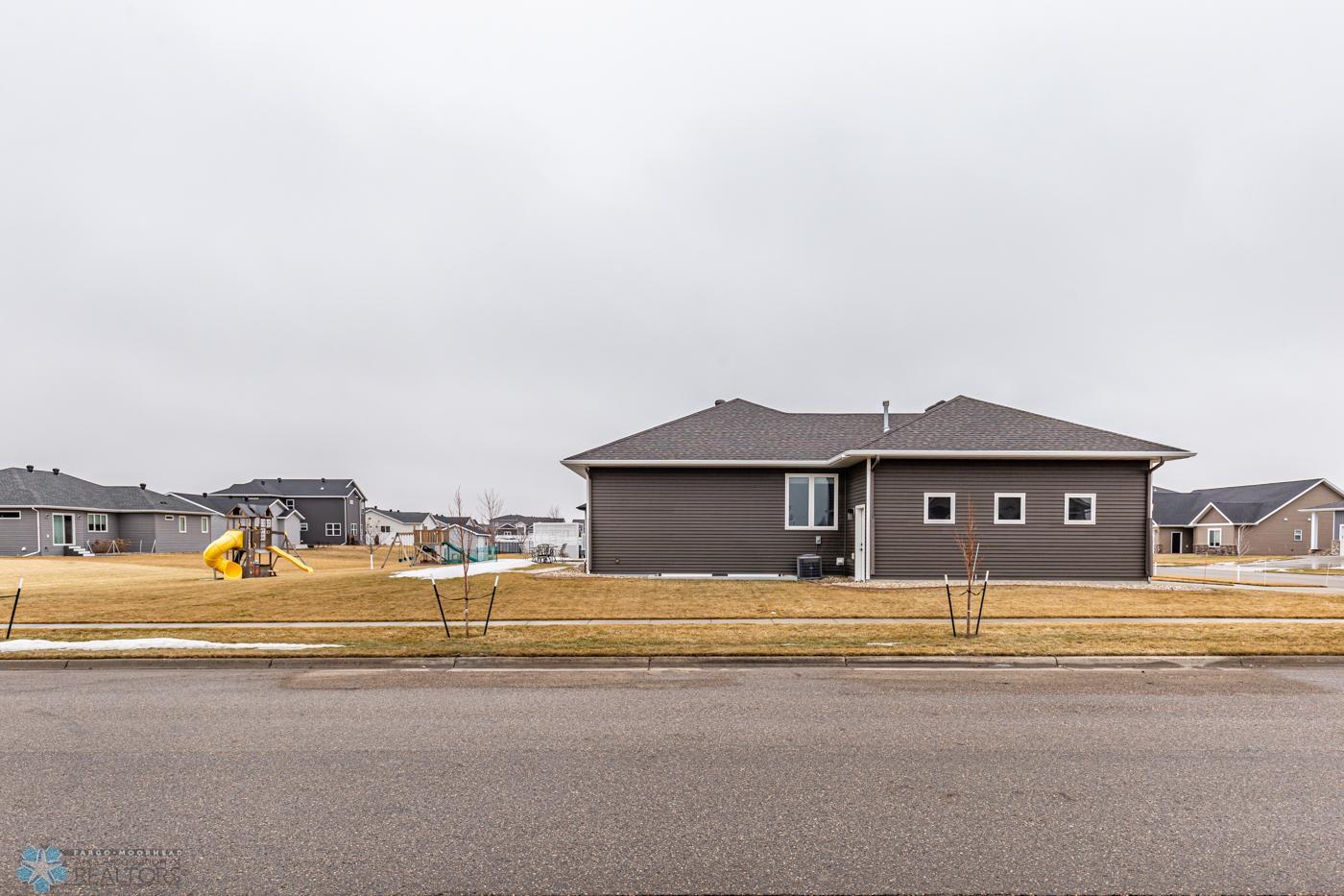 Side Yard | notice the extra windows in the garage!