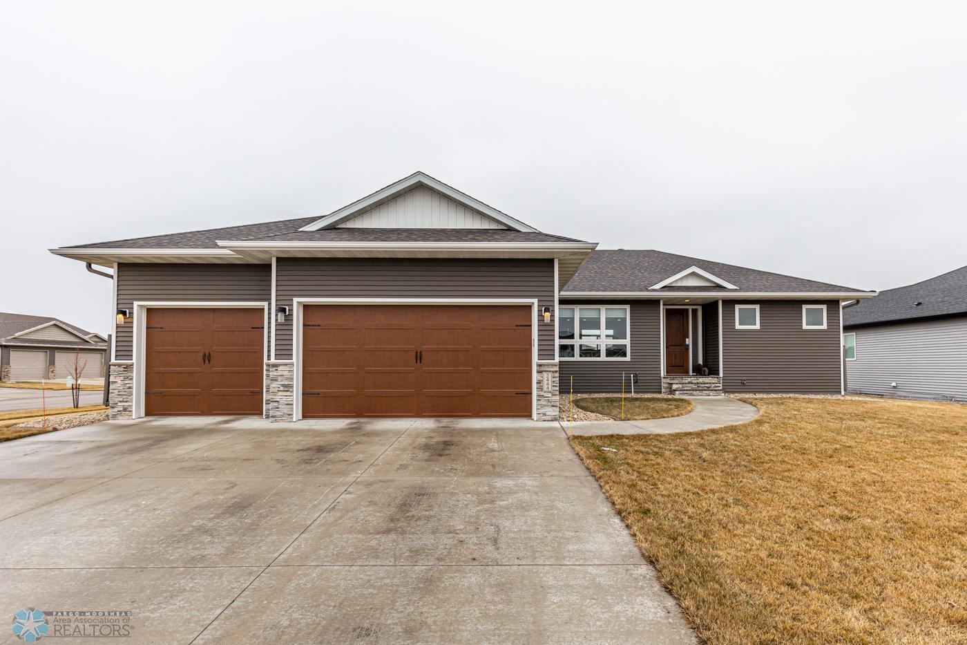Welcome to 2444 Harbor Lane, West Fargo | 6 Bedroom, 3 bath, 3 car garage. Family room w/wet bar. Great neighborhood!