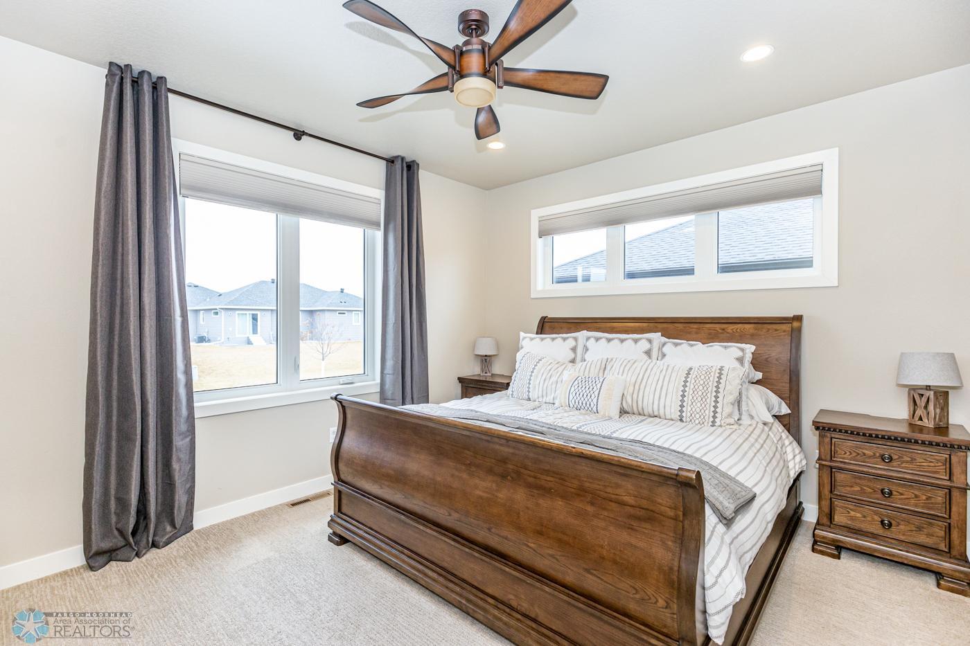 Primary Bedroom with walk-in closet, 2nd closet, private bathroom & transom window