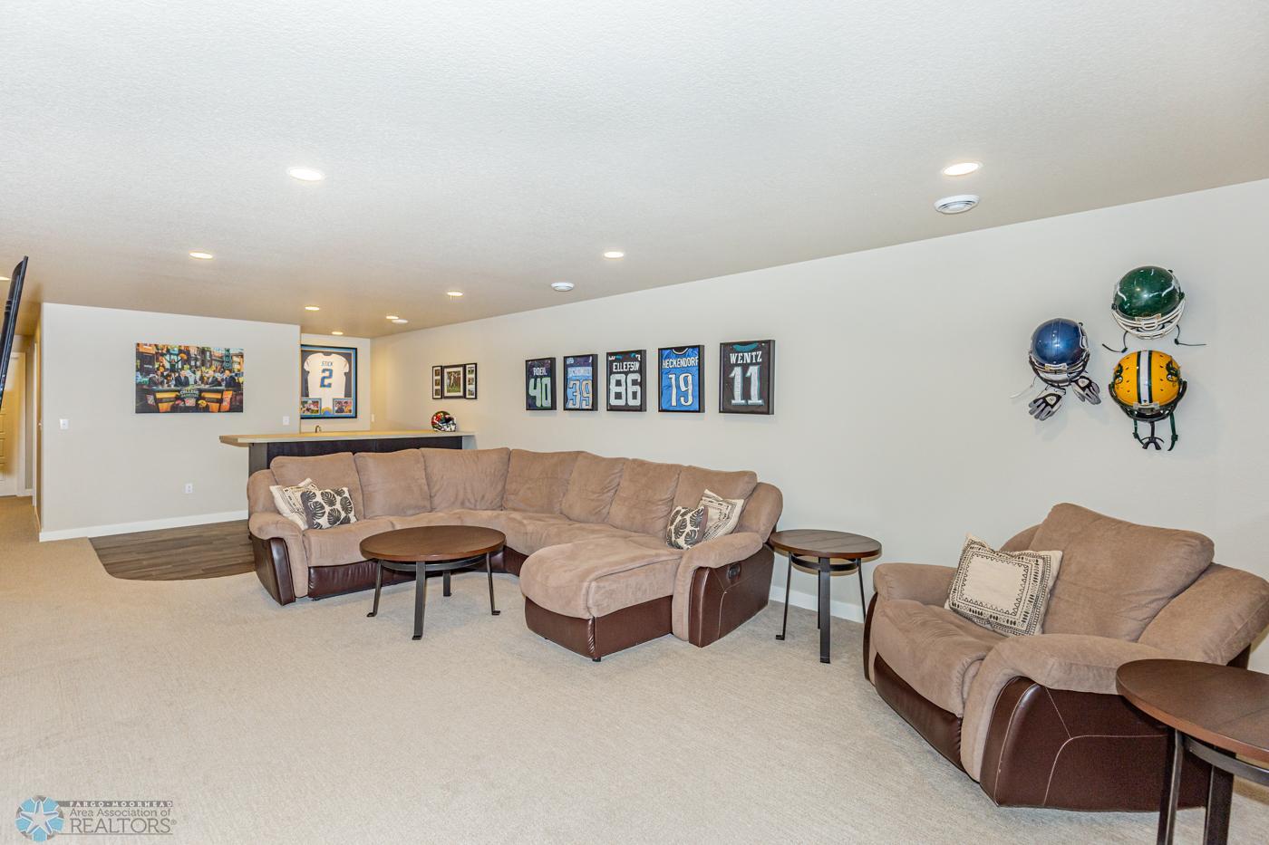 Family Room with wet bar, and extra large egress window for light