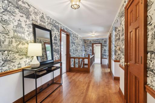 Upper hallway leading to 5 generous bedrooms