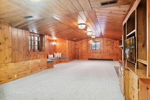 This lower-level family room is warm, inviting, and large!