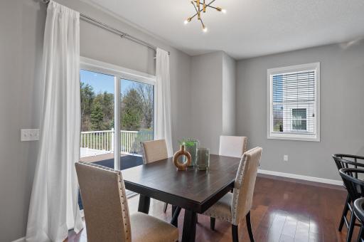 Informal dining room, and access to sliding door to the maintenance free deck!