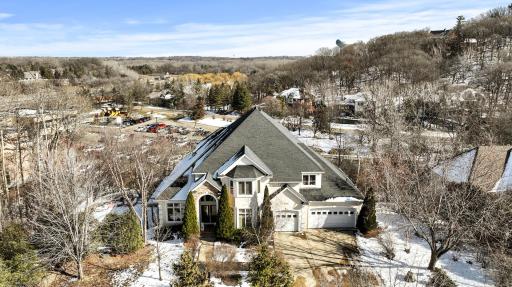 Nestled in the prestigious Arrowhead Pointe neighborhood of Edina, this two-story residence in a private cul-de-sac offers an ideal blend of luxury living and community convenience.
